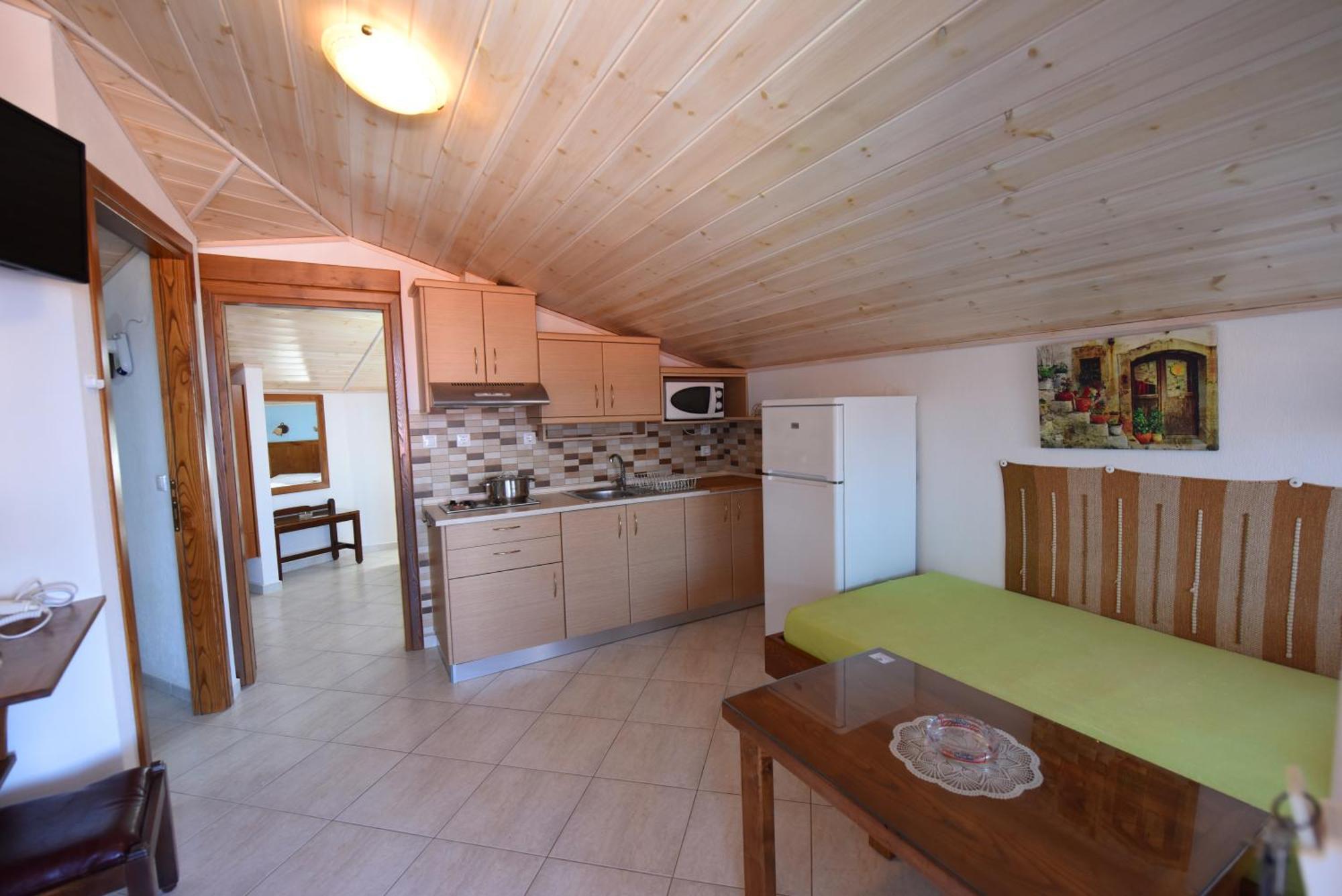Haus Niko Apartments And Suites Nea Poteidaia Habitación foto